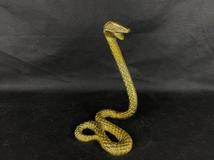 Figura de serpiente dorada