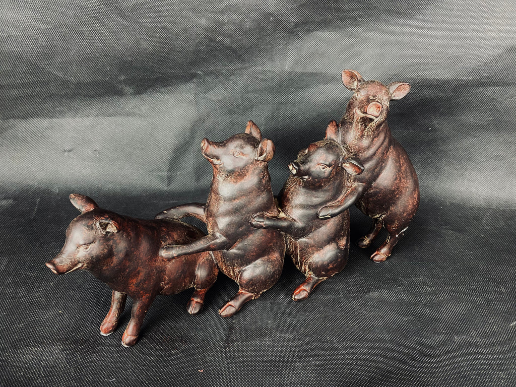 Escultura puerquitos