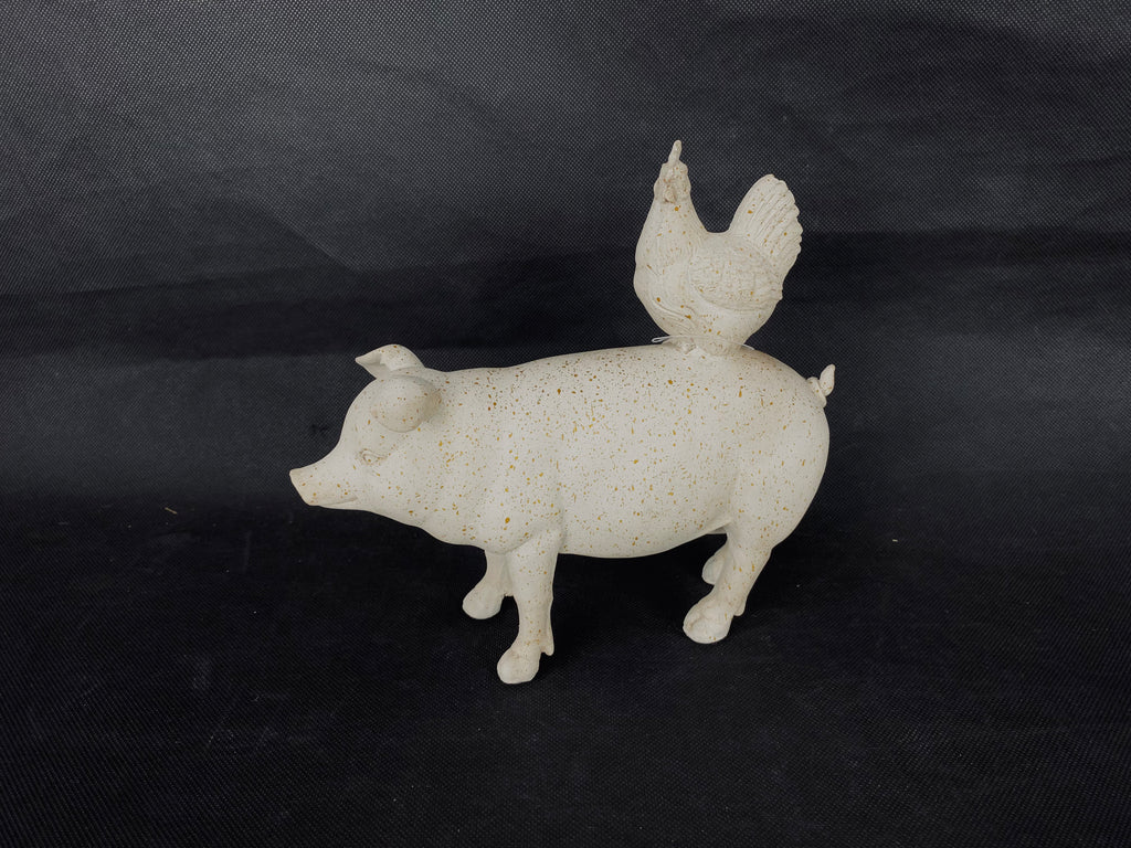 PUERQUITO CON GALLINA